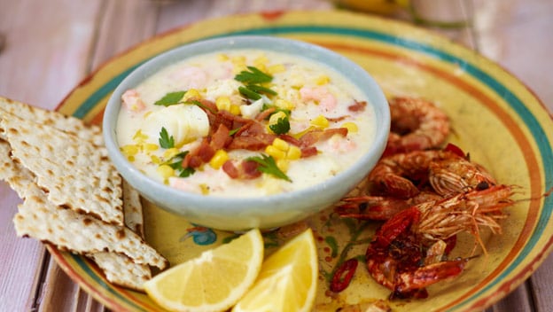 Smoked-fish chowder with spicy grilled prawns