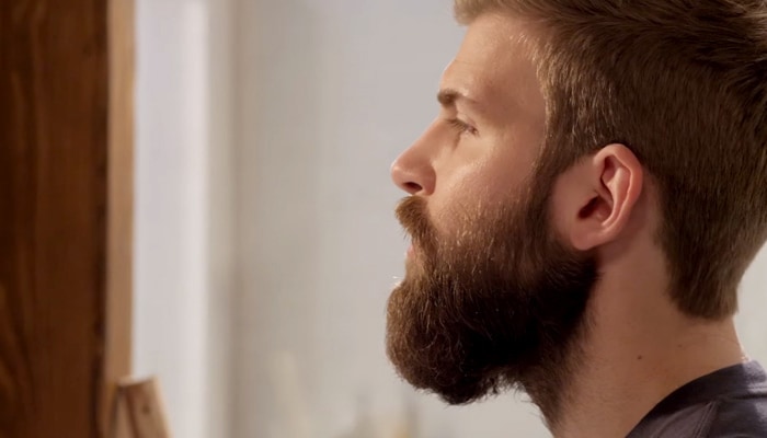 Instructional video of man maintaining his beard